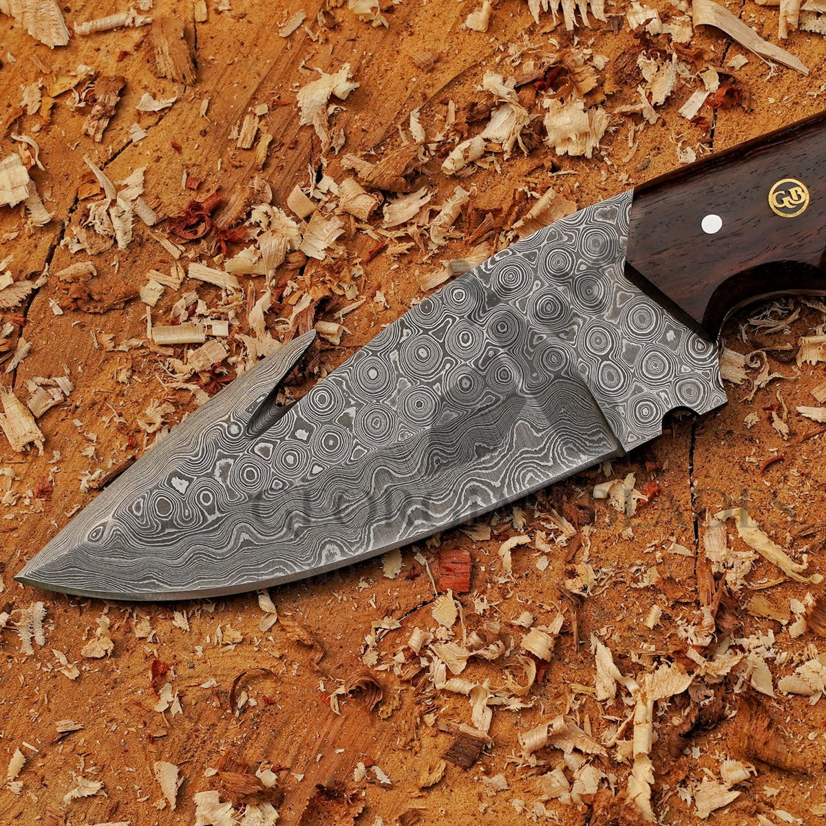 Damascus blade of the Trailblazer's Blade hunting knife
