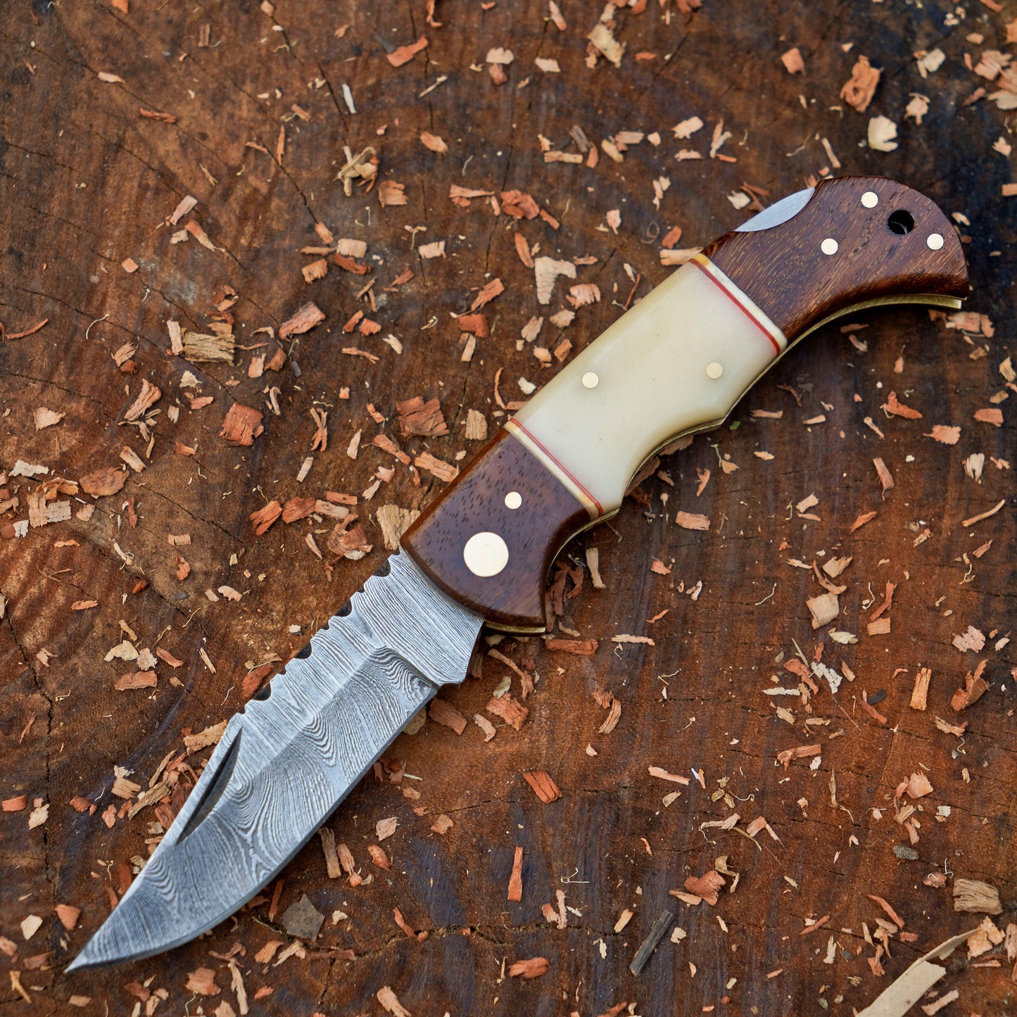 Horned Hunter: Custom Forged Damascus Steel Folding Knife Wood & Bone Handle