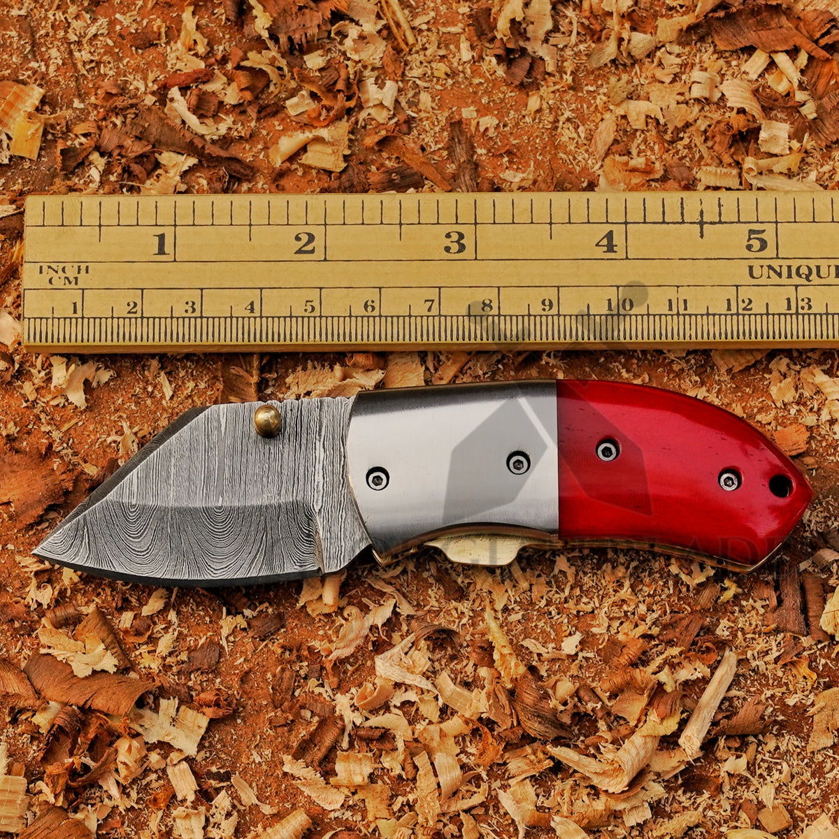 Ember Pocket – Handmade Damascus Steel Folding Knife with Red Bone Handle