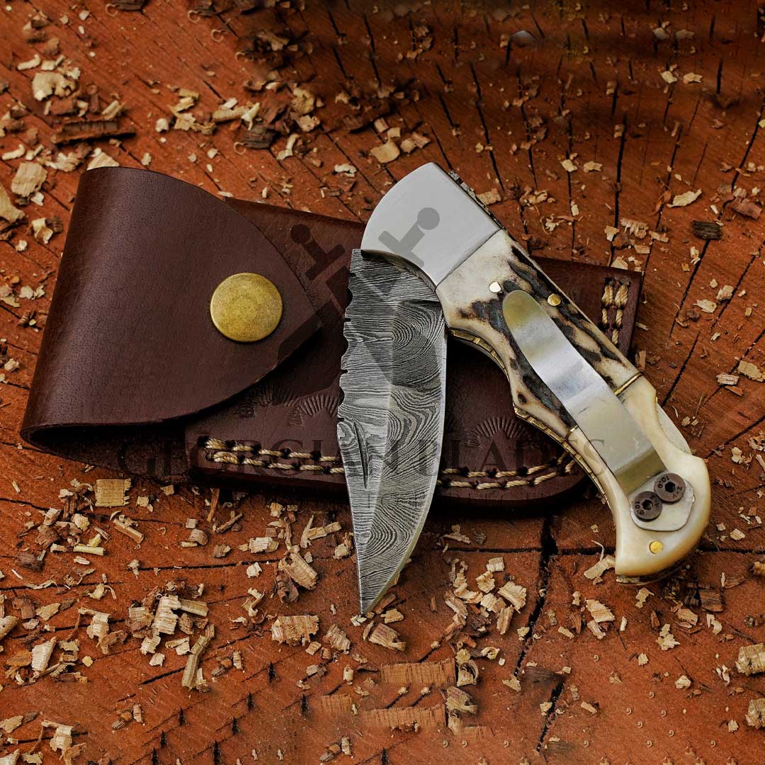 The "Boone's Edge" 6.75 inch Handmade Folding Knife Damascus Steel with Stag horn and Camel bone Handle with Leather Sheath