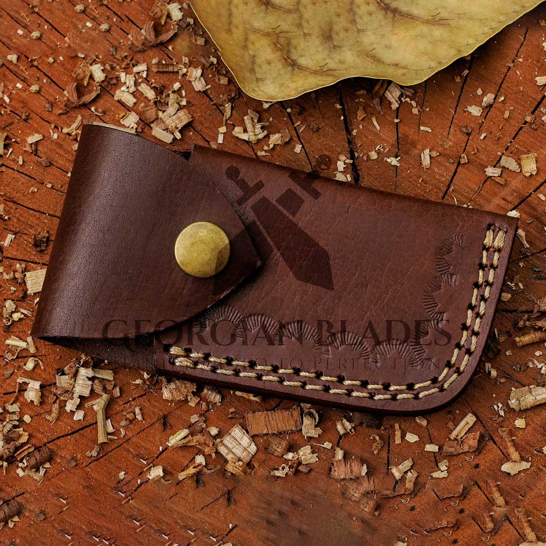 The "Boone's Edge" 6.75 inch Handmade Folding Knife Damascus Steel with Stag horn and Camel bone Handle with Leather Sheath