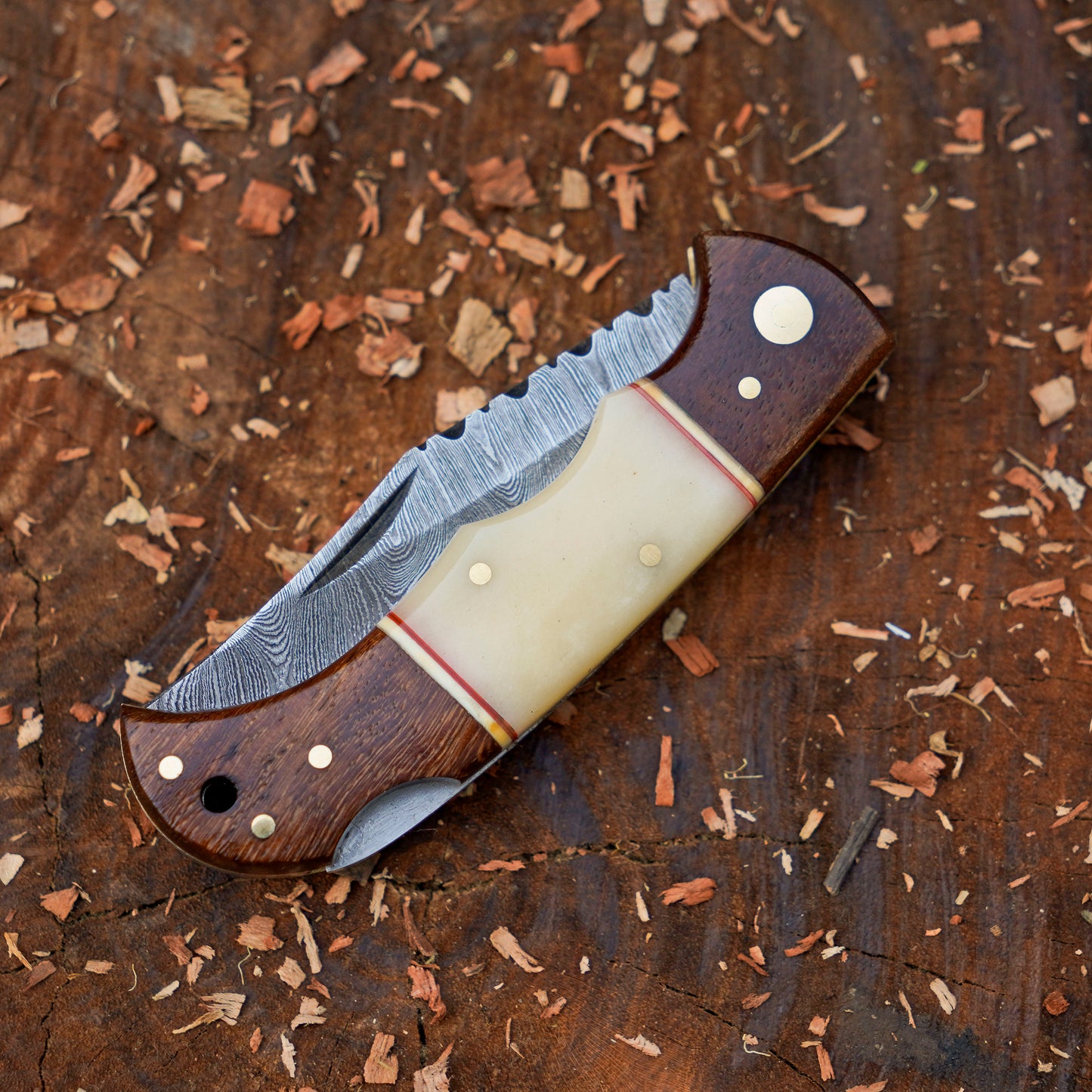 Horned Hunter: Custom Forged Damascus Steel Folding Knife Wood & Bone Handle