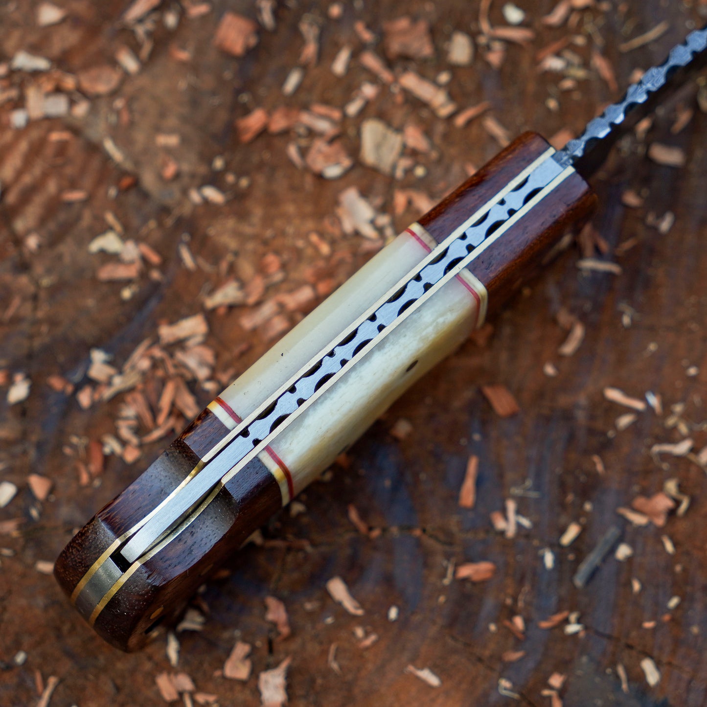 Horned Hunter: Custom Forged Damascus Steel Folding Knife Wood & Bone Handle