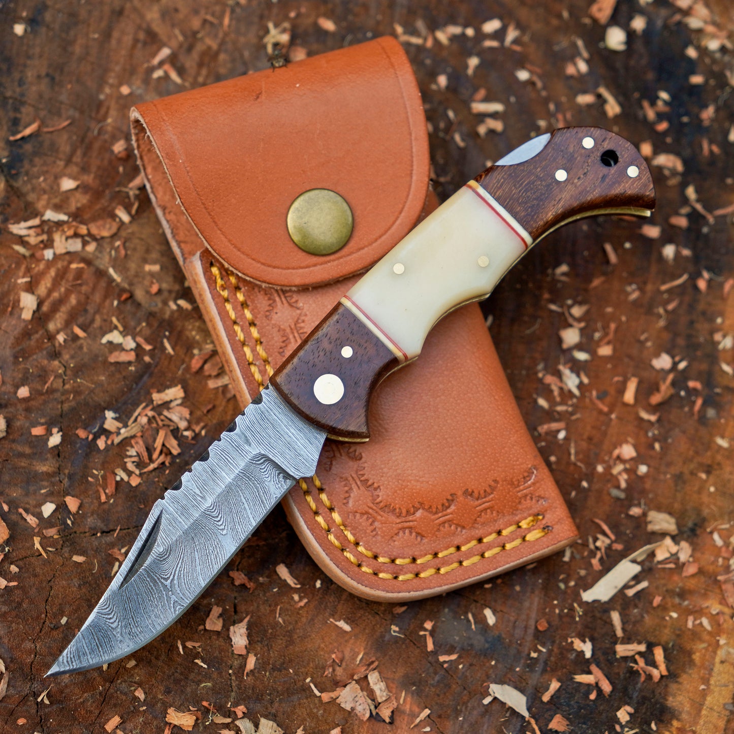 Horned Hunter: Custom Forged Damascus Steel Folding Knife Wood & Bone Handle
