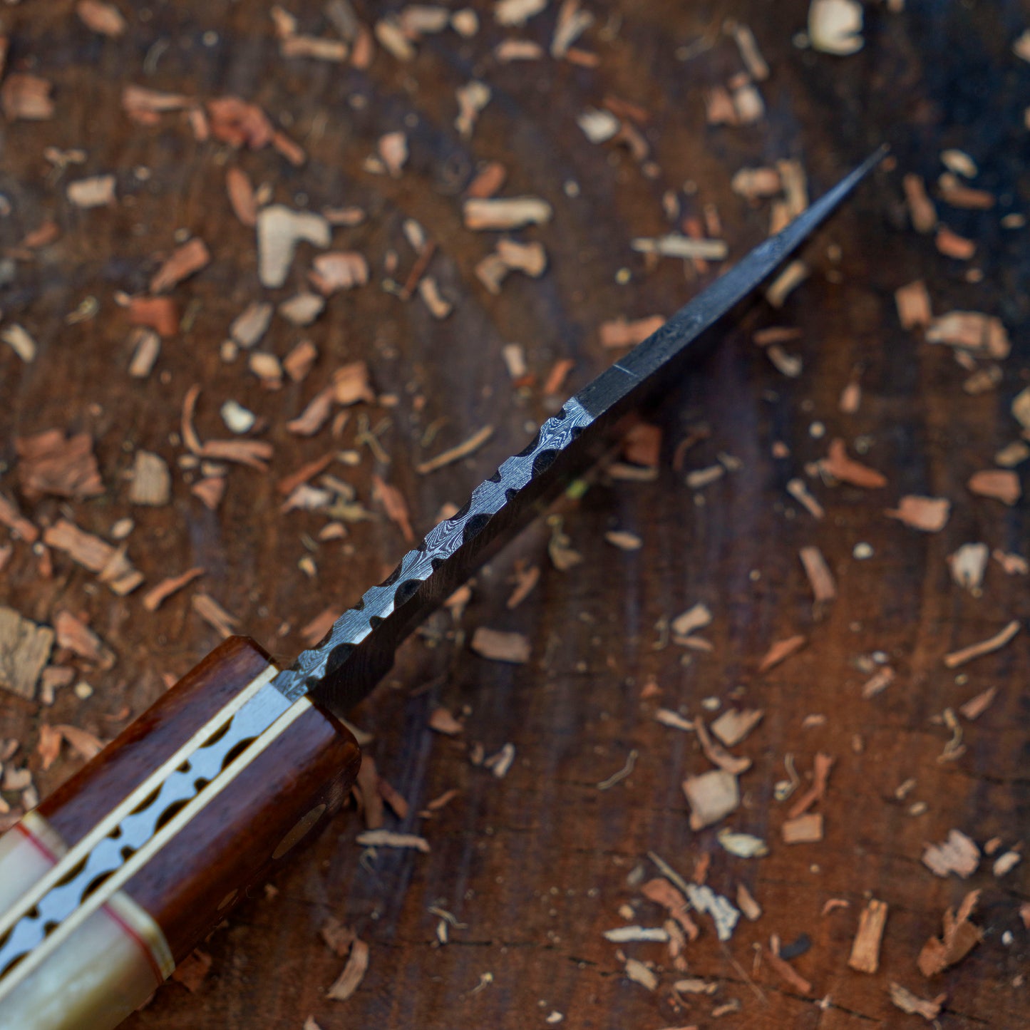 Horned Hunter: Custom Forged Damascus Steel Folding Knife Wood & Bone Handle