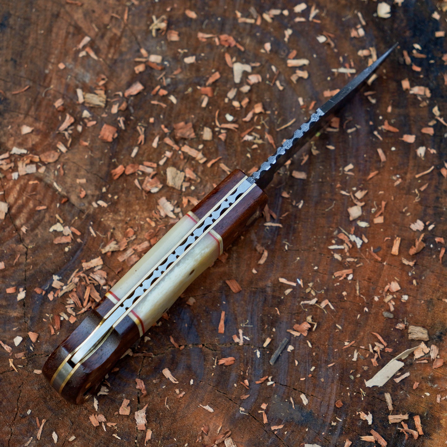 Horned Hunter: Custom Forged Damascus Steel Folding Knife Wood & Bone Handle