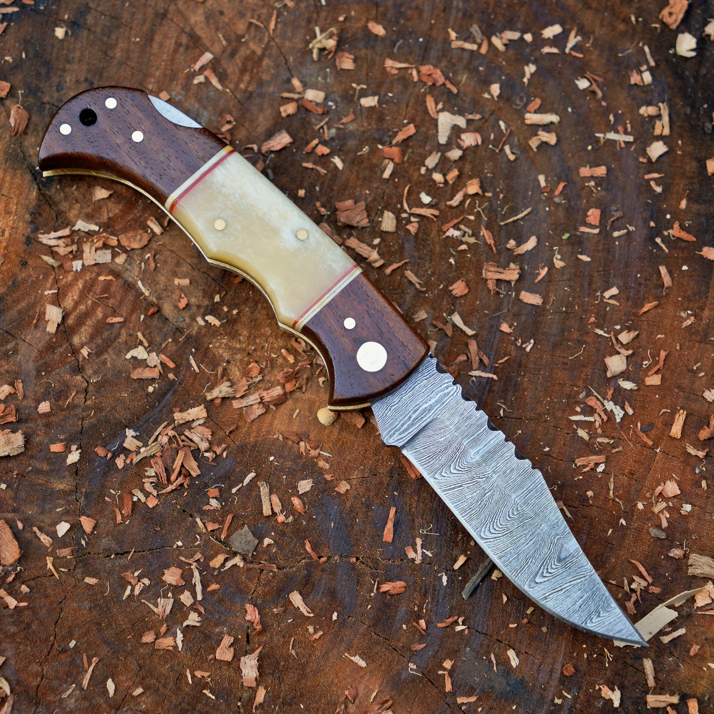 Horned Hunter: Custom Forged Damascus Steel Folding Knife Wood & Bone Handle