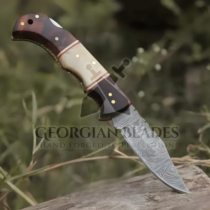 Horned Hunter: Custom Forged Damascus Steel Folding Knife Wood & Bone Handle