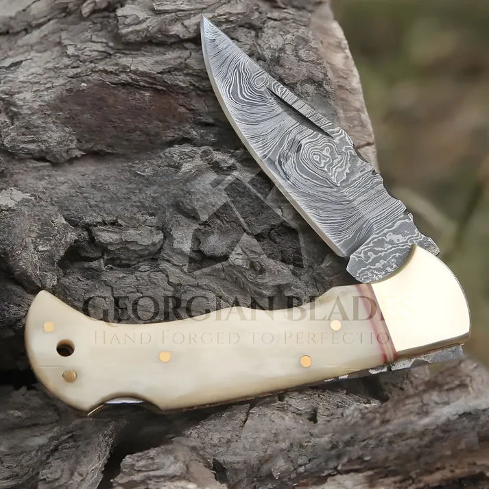 Skeletal Saber - Custom Hand Forged Damascus Folding Knife Engraved Brass Bolster With Bone Handle