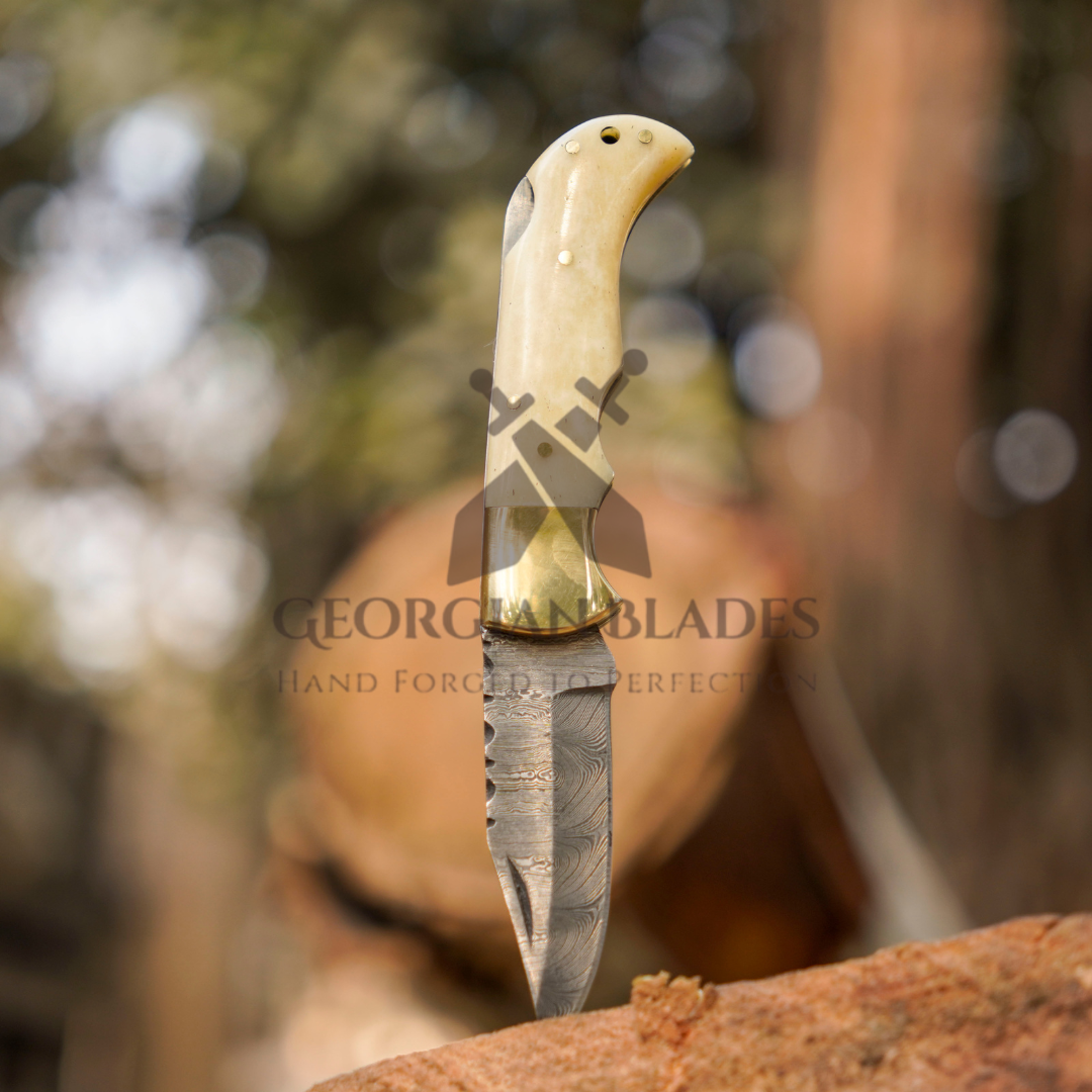 Skeletal Saber - Custom Hand Forged Damascus Folding Knife Engraved Brass Bolster With Bone Handle