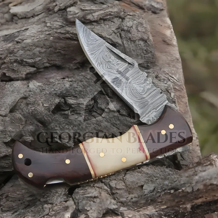 Horned Hunter: Custom Forged Damascus Steel Folding Knife Wood & Bone Handle