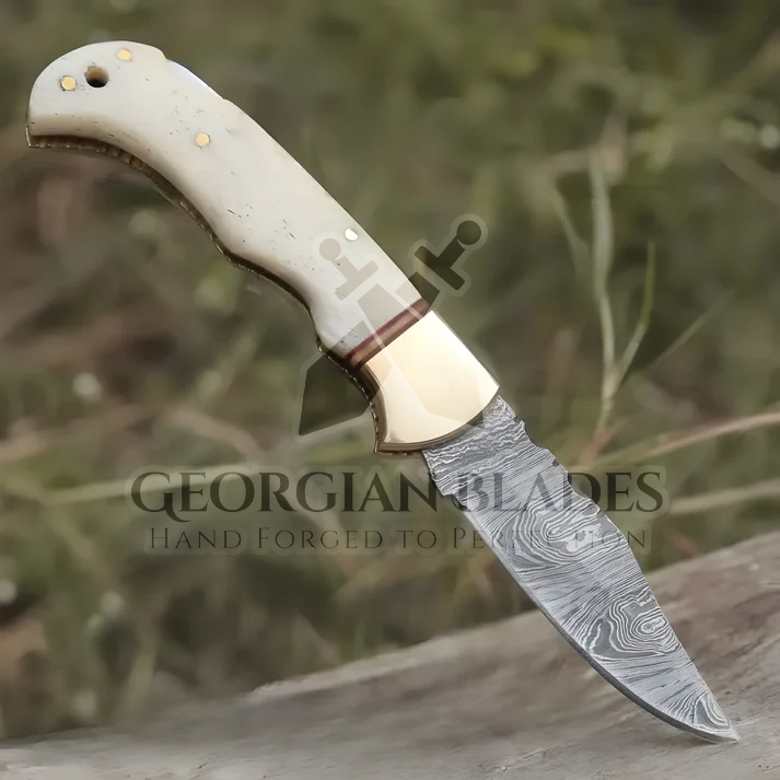 Skeletal Saber - Custom Hand Forged Damascus Folding Knife Engraved Brass Bolster With Bone Handle