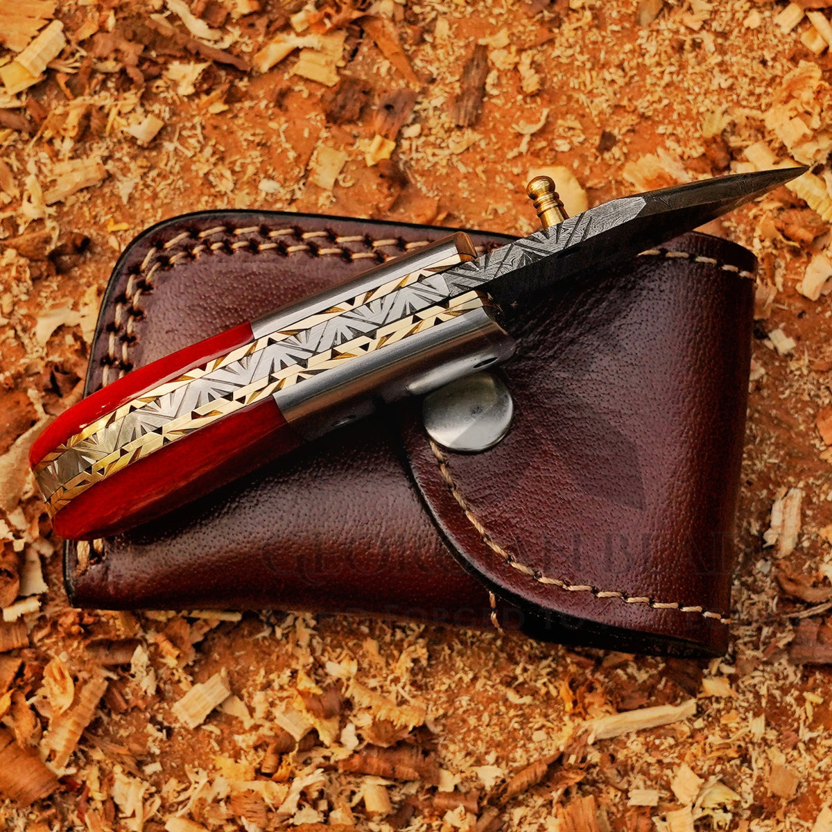 Ember Pocket – Handmade Damascus Steel Folding Knife with Red Bone Handle