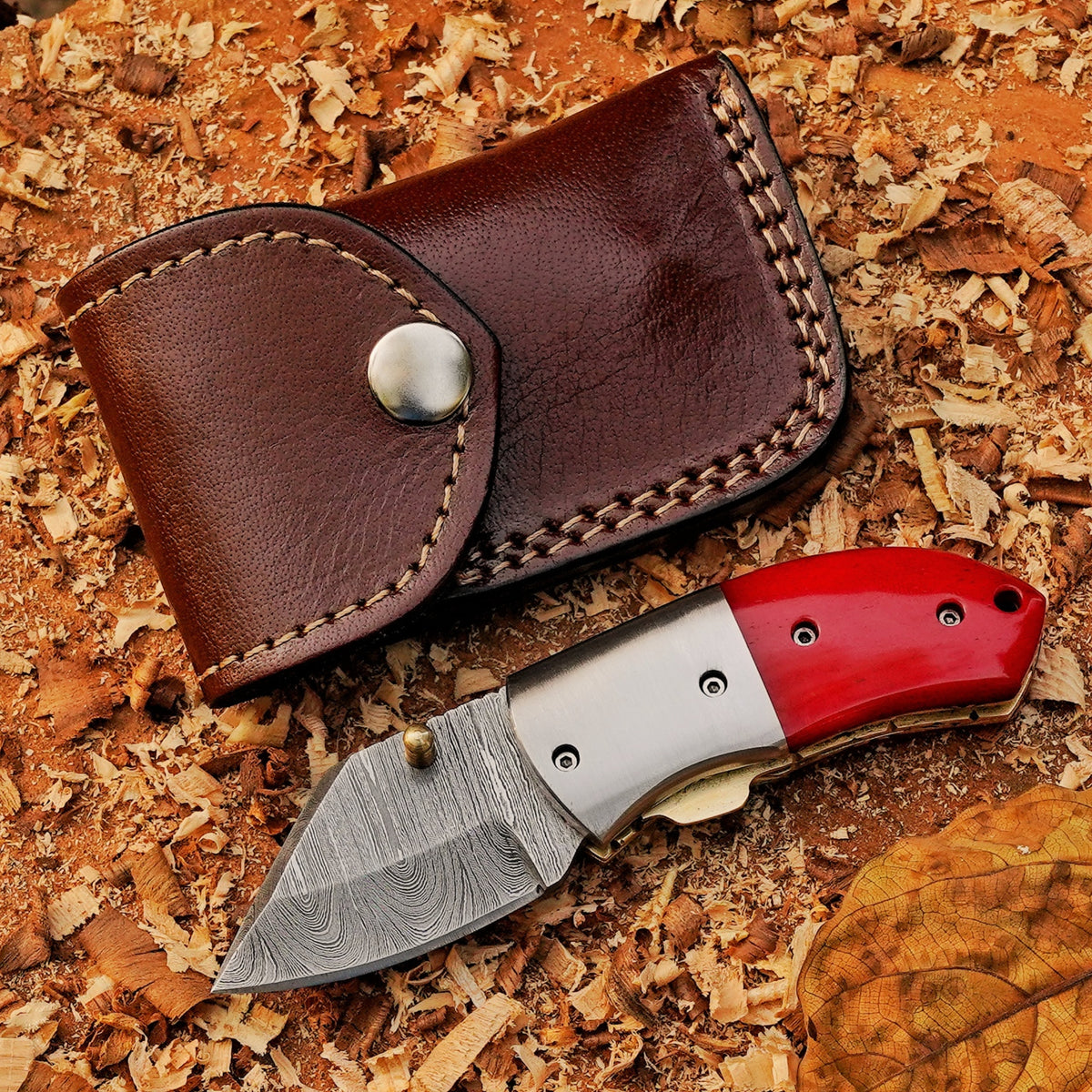 Ember Pocket – Handmade Damascus Steel Folding Knife with Red Bone Handle