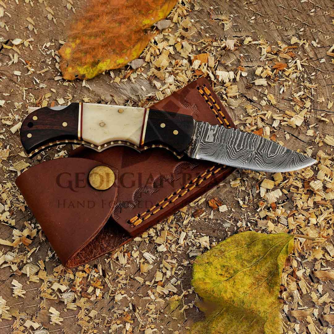 Horned Hunter: Custom Forged Damascus Steel Folding Knife Wood & Bone Handle