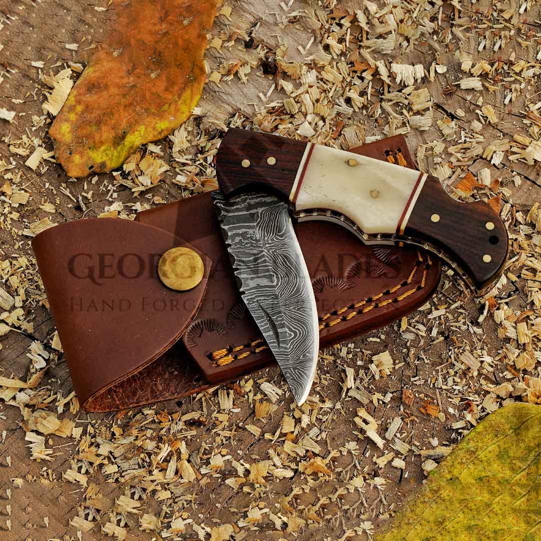 Horned Hunter: Custom Forged Damascus Steel Folding Knife Wood & Bone Handle